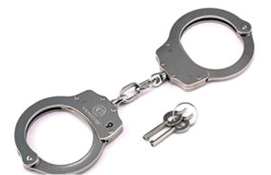 How To Propagate Truth in a “School-shooting” Case: File a RICO Suit photo of handcuffs