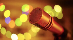 image of microphone on colorful background